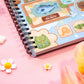 Camp Sunshine Spiral Lined Notebook (7x9")